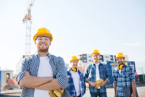 men in hard hats on construction site