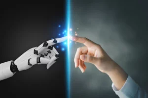 A robotic hand and a human hand touching fingers and creating sparks